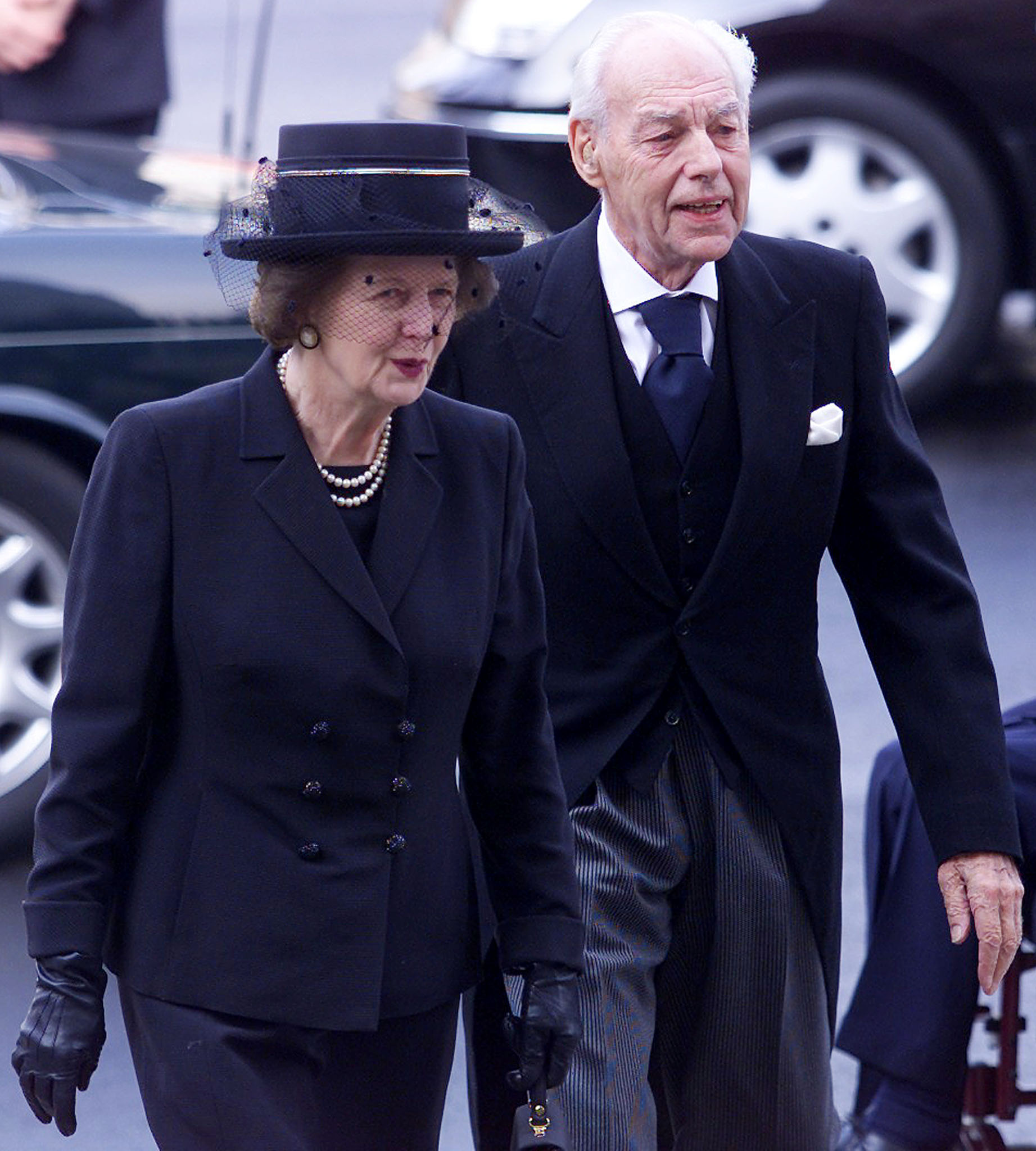 <p>Baroness Margaret Thatcher, a former U.K. prime minister, and husband Dennis Thatcher arrived at London's Westminster Abbey for the funeral of Queen Elizabeth the Queen Mother on April 9, 2002. </p>