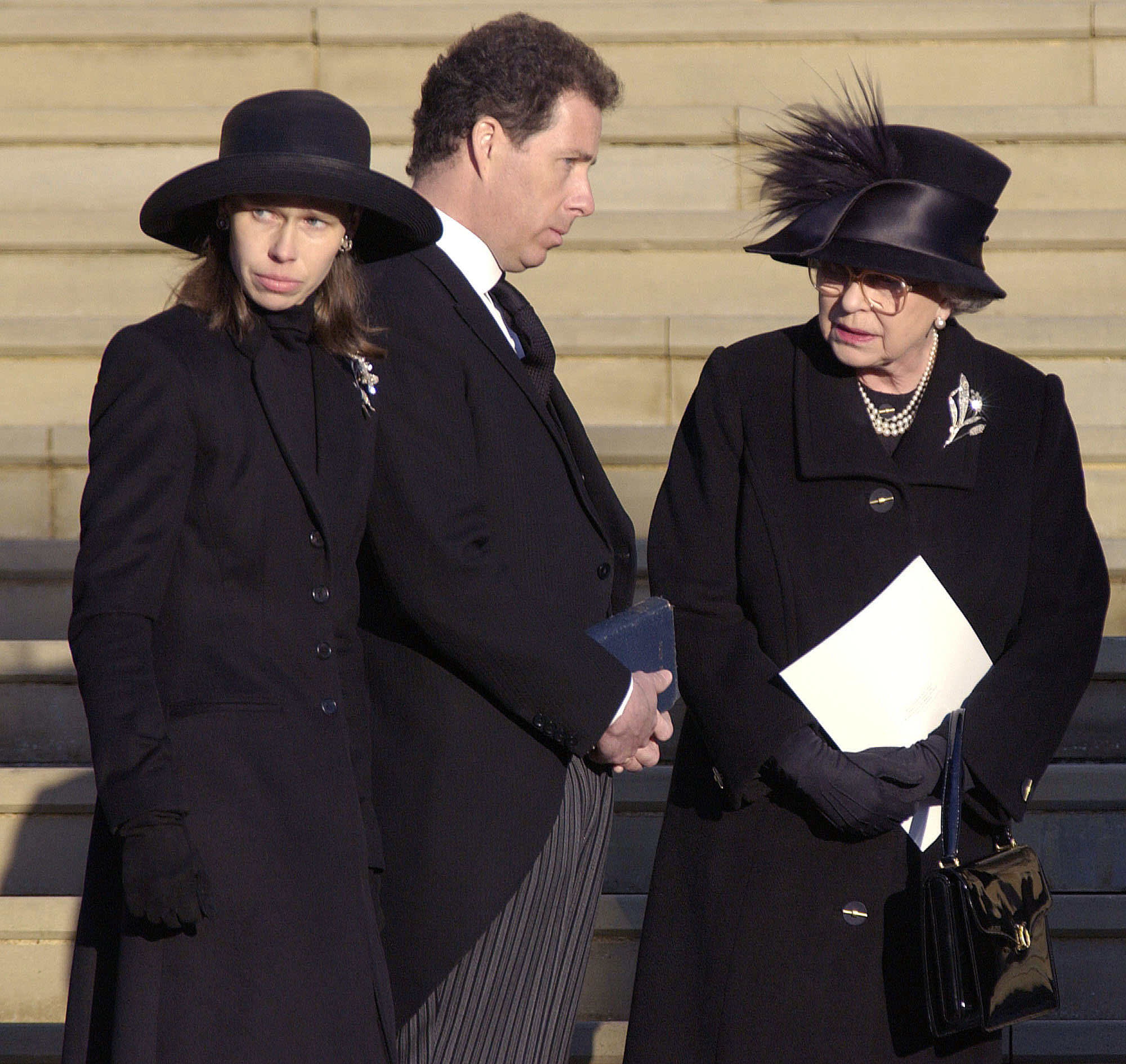 <p>Princess Margaret's children -- Lady Sarah Chatto and David Armstrong-Jones, then known as Viscount Linley (now 2nd Earl of Snowdon) -- were photographed with their aunt, Queen Elizabeth II, on the steps of St. George's Chapel at Windsor Castle following their mother's funeral service on Feb. 15, 2002. </p>