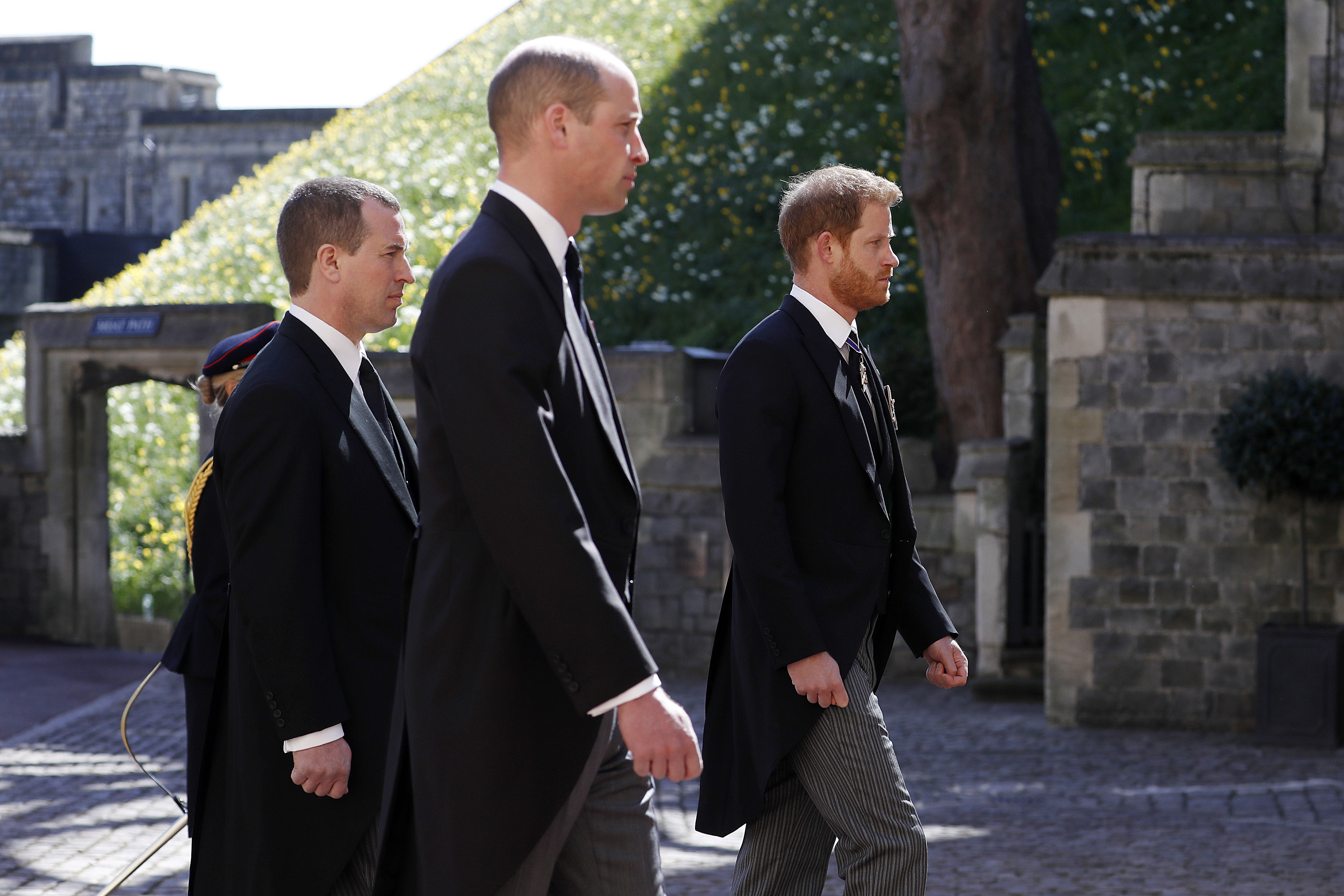 <p>Prince Philip's grandsons Peter Phillips, <a href="https://www.wonderwall.com/celebrity/profiles/overview/prince-william-482.article">Prince William</a> and <a href="https://www.wonderwall.com/celebrity/profiles/overview/prince-harry-481.article">Prince Harry</a> walked behind his casket during his funeral at Windsor Castle on April 17, 2021.</p>