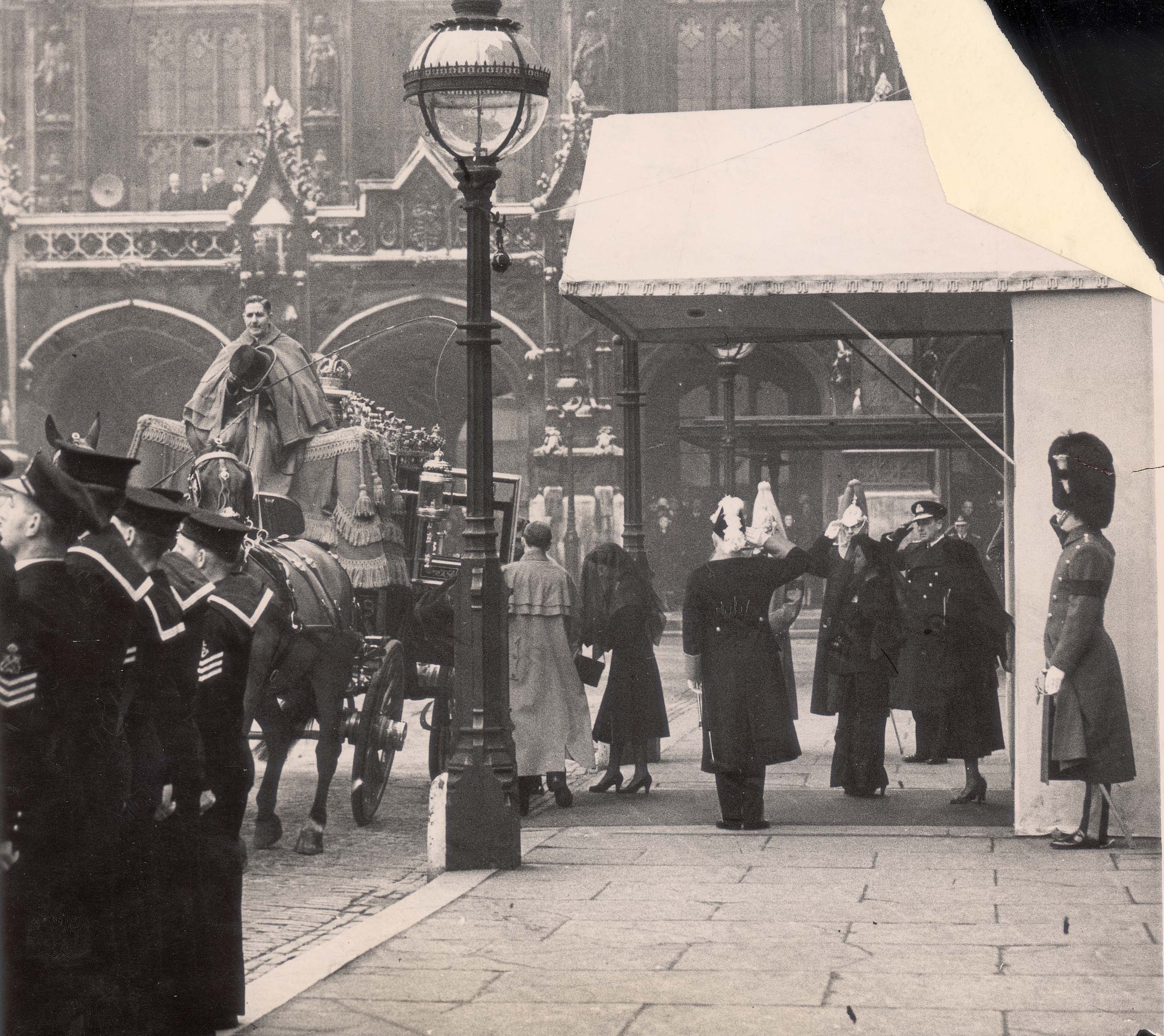 <p>A veiled Queen Elizabeth II, followed by Queen Elizabeth the Queen Mother and Princess Margaret, prepared to leave Westminster Hall in London in a carriage for the funeral of King George VI on Feb. 15, 1952.</p>