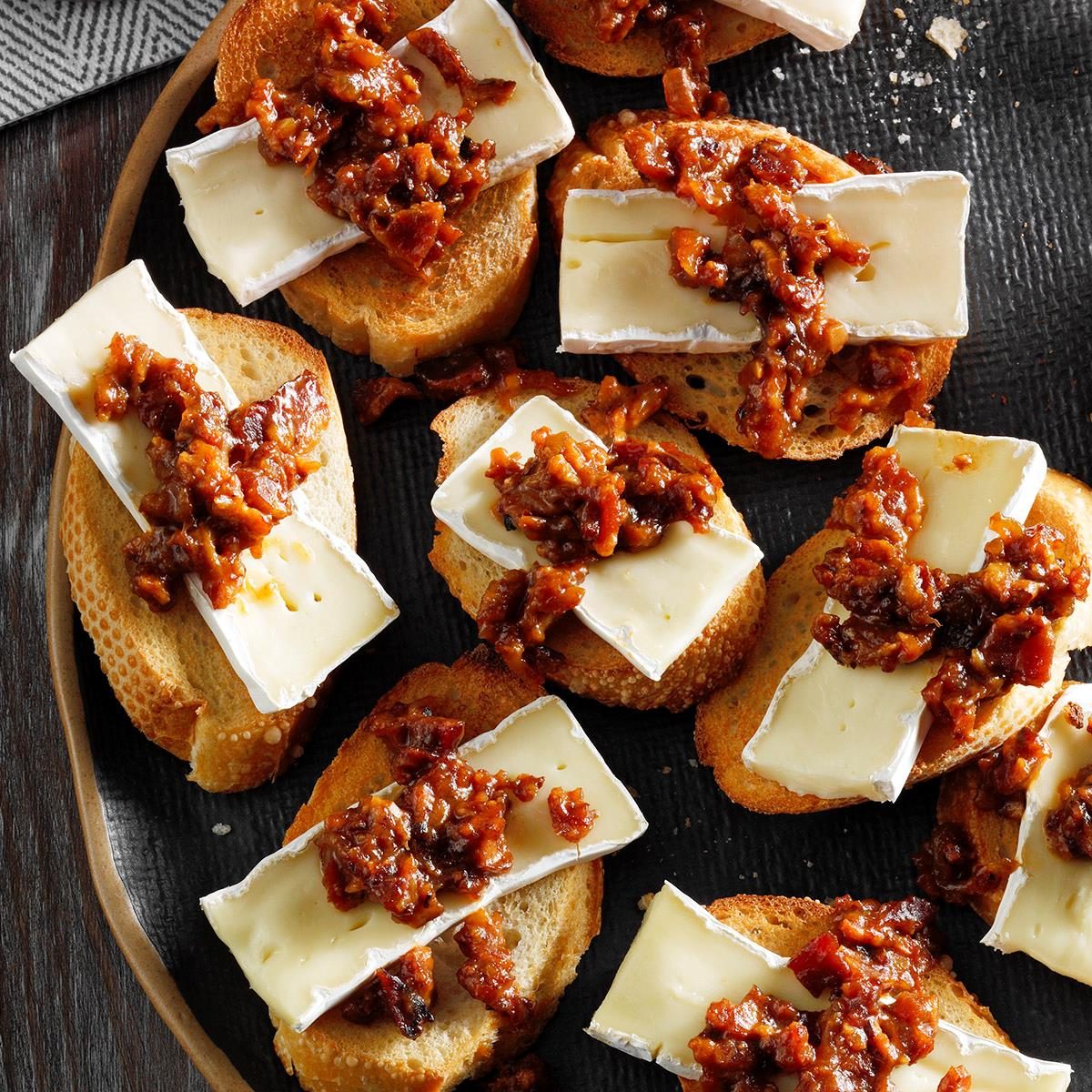 <p>Among my friends I'm known as the pork master, because I love to cook just about every cut there is. These appetizers combine soft, mild Brie cheese with a sweet-sour bacon jam that has a touch of Sriracha sauce. —Rick Pascocello, New York, New York</p> <div class="listicle-page__buttons"> <div class="listicle-page__cta-button"><a href='https://www.tasteofhome.com/recipes/brie-appetizers-with-bacon-plum-jam/'>Go to Recipe</a></div> </div>
