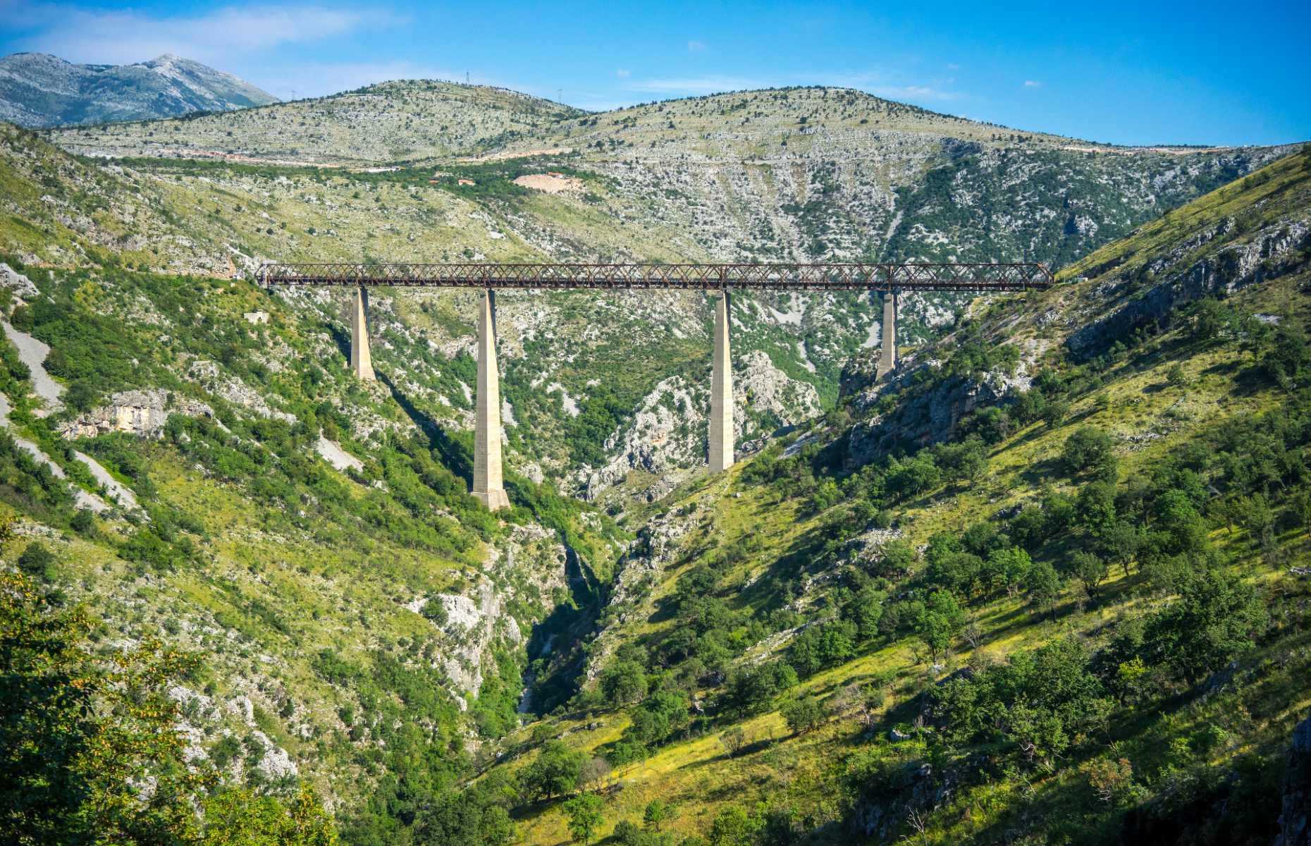 <p>There aren’t a whole lot of options for exploring the famously bus-heavy Balkans by rail, but this legendary 10-hour journey takes in some of the best scenery Serbia, Bosnia and Herzegovina and Montenegro have to offer. That includes this eye-wateringly high bridge, which teeters 656 feet (200m) above the Mala Rijeka viaduct (until 2001 it was the highest railway bridge in the world). But it’s one of just 435 bridges along the route – necessary to cross all the mountains and gorges. </p>