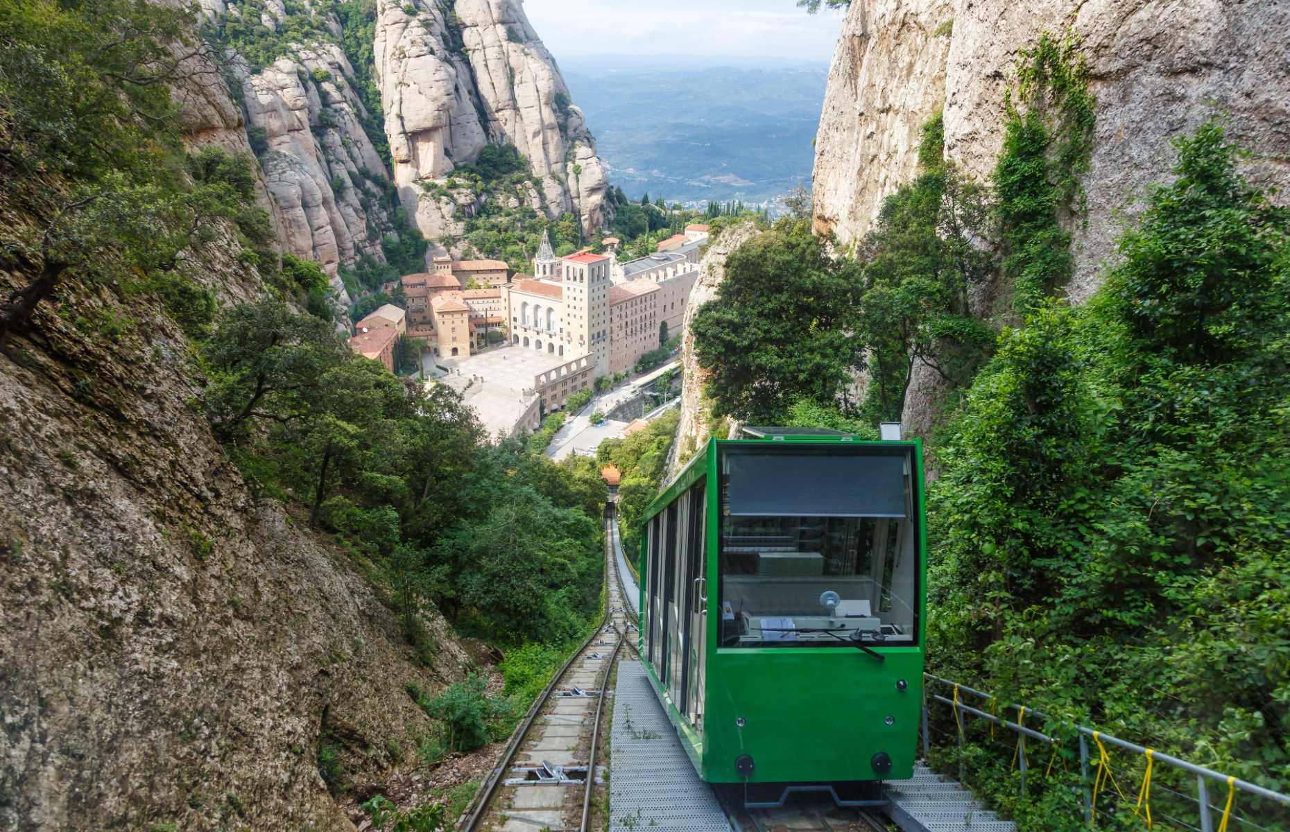 <p>The storied mountaintop monastery of Montserrat is one of the most gorgeous parts of Catalonia – but did you know you can reach it by train? The <a href="https://bcnshop.barcelonaturisme.com/shopv3/en/product/615/tot-montserrat.html">ToT Montserrat</a> is an ultra-scenic route which runs between Barcelona and the foothills of the peak, at which point you can choose between taking the cable car (Aeri) or the rack railway (Cremallera) up to the Montserrat Monastery. Whichever option you go for, you’ll be rewarded with sweeping vistas across the rugged valley.</p>