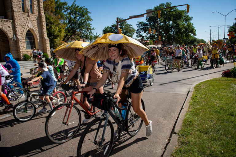 Tour de Fat participants ride along Mountain Avenue in Fort Collins, Colo. on Saturday, Sept. 3, 2022. Over 20,000 people walked, skate and rode their bikes in elaborate costumes during Tour de Fat 2022.