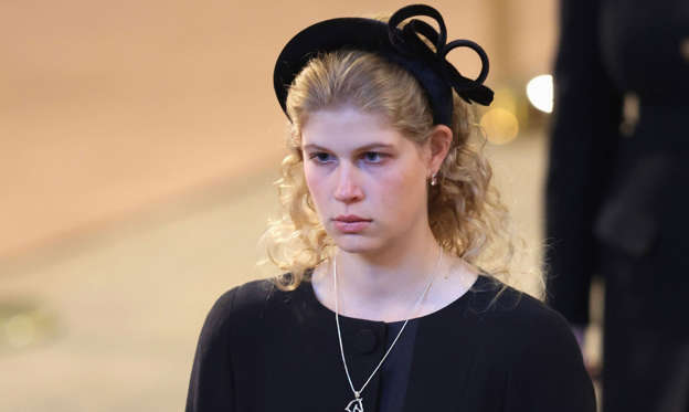 Slide 1 of 38: Wearing a horse necklace in honour of the passion shared with Her Late Majesty for horses, Lady Louise Windsor was visibly heartbroken as she attended the committal service and funeral of her grandmother, Queen Elizabeth II.