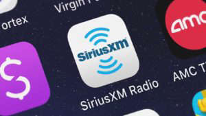 The Sirius XM (SIRI) mobile app logo on a smartphone screen.