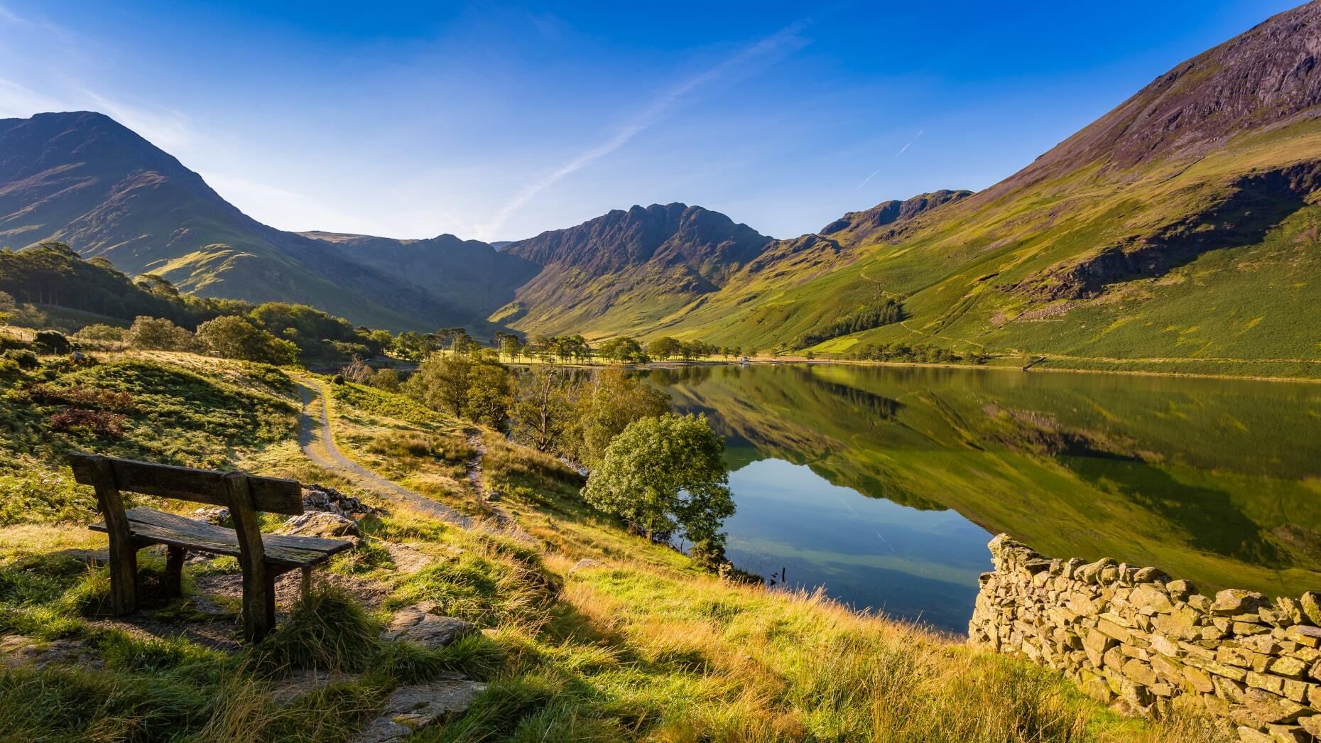 <p>Well known for harbouring some of the greenest scenery in England, <a href="https://www.lakedistrict.gov.uk/" class="atom_link atom_valid" rel="noreferrer noopener">Lake District National Park</a> is located in the northeast of the country and covers an area of 2,362 square kilometres (912 square miles). With its lush hills and sparkling lakes, this region is guaranteed to make any nature lover’s heart dance. Bibliophiles will also be happy to learn that English author Beatrix Potter helped lead efforts to preserve this magical area.</p>