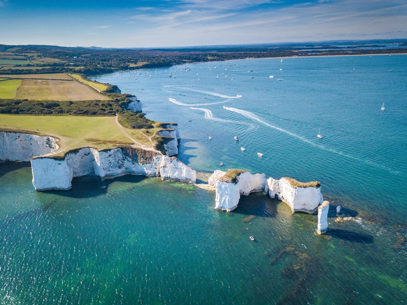 <p>Also located in the county of Dorset, <a href="https://jurassiccoast.org/visit/attractions/old-harry-rocks/" class="atom_link atom_valid" rel="noreferrer noopener">Old Harry Rocks</a> is another breathtaking area you won’t want to miss. Its huge limestone rocks extend into the English Channel and are as impressive to see on land as they are from the sea in a kayak. A number of boat trips are also available to take you around the attractions of the Jurassic Coast.</p>
