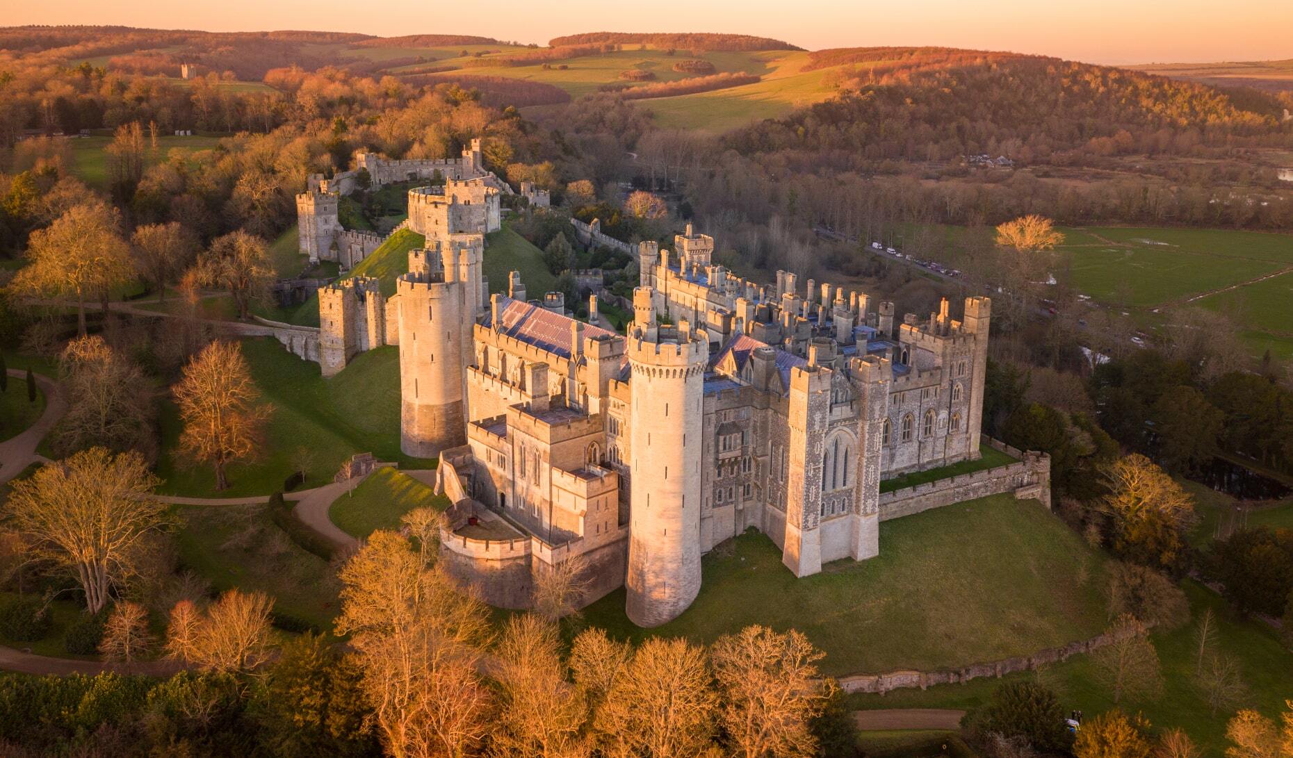 <p>Founded in the 11th century by Roger de Montgomery, <a href="https://www.arundelcastle.org/" class="atom_link atom_valid" rel="noreferrer noopener">Arundel Castle</a> was almost completely rebuilt in the late 19th century. Thanks to its incredible Gothic architecture, it is considered one of the most beautiful works of the Victorian era. If you visit Arundel Castle, you’ll also get to see an impressive collection of artworks and take a stroll through its beautiful gardens, where you can catch medieval re-enactments during the summer.</p>