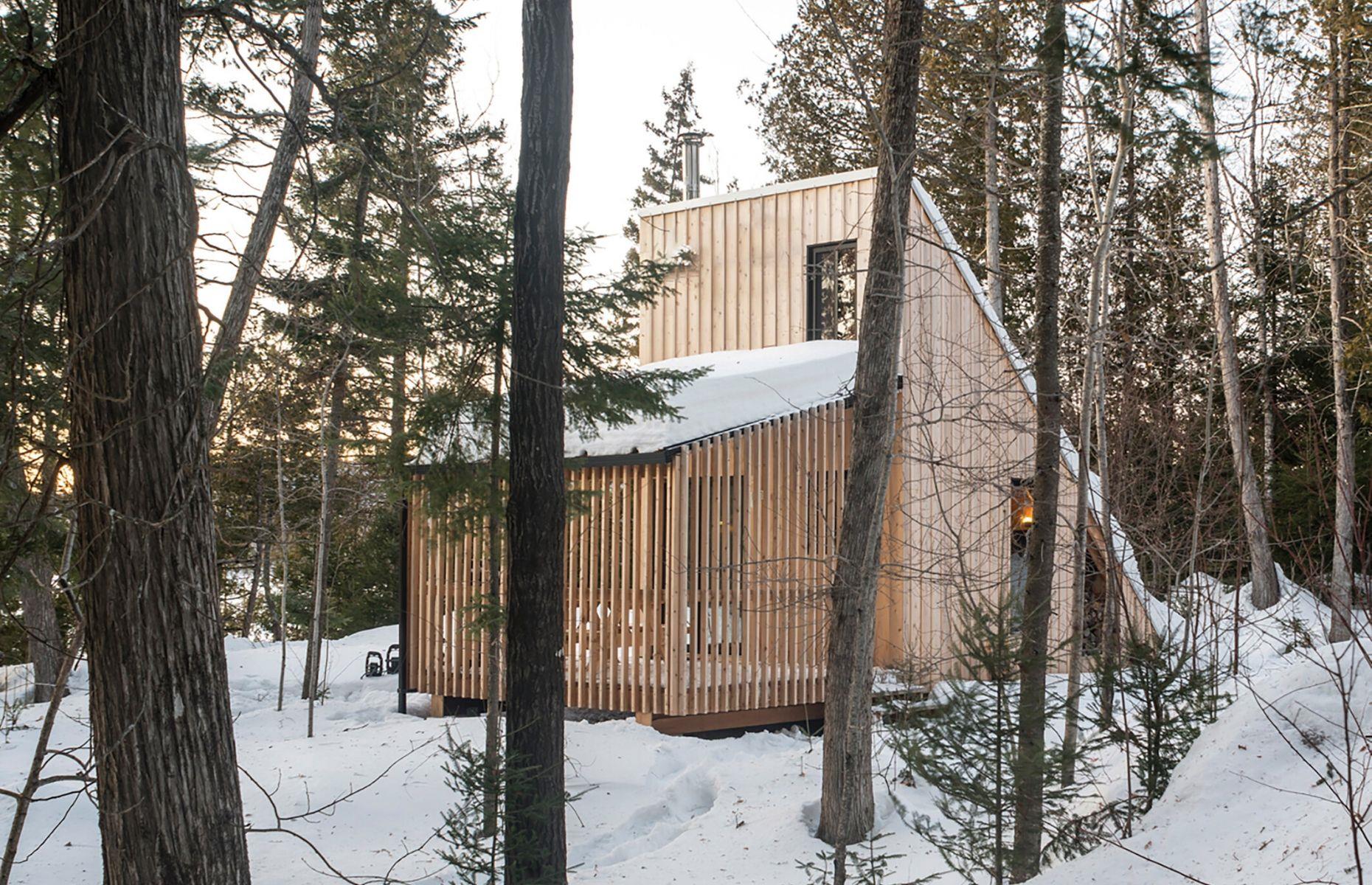 <p>Designed by the architects at <a href="http://labri.ca/">L'Abri</a>, this stunning tiny home can be found concealed inside Poisson Blanc Regional Park, in Ottawa. Known as La Pointe (or The Point), the angular abode is a reinterpretation of classic A-frame buildings popularized across North American during the 1950s. Traditional yet modern in its aesthetic, the dwelling sits completely off-the-grid and is powered entirely by solar rays!</p>