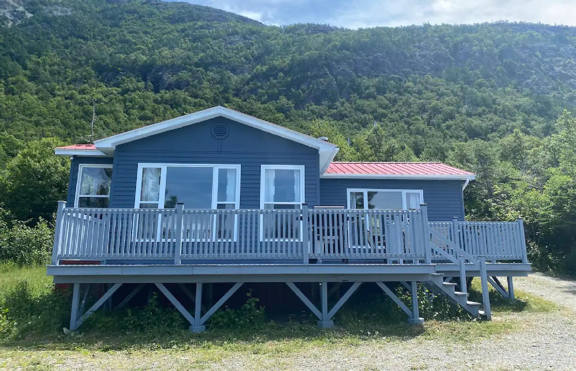 <p>All of the province of Newfoundland and Labrador is fairly remote relative to the rest of North America, but this <a href="https://www.airbnb.co.uk/rooms/39123645?adults=1&children=0&infants=0&check_in=2022-10-11&check_out=2022-10-18&federated_search_id=b75094e7-a395-4d62-8ccf-b7fc6ce41e92&source_impression_id=p3_1662925069_jP%2Bydm4P%2FSoGw%2FJi">homey cottage</a> on the island’s southwest shore offers even more room to breathe. On the shore of the Bay of Islands, the views from the house are incredible, especially in the evening when guests can sit by the fire pit and watch the sun go down. One bedroom and three beds (including a bunk bed) makes this one big enough for five people on a family getaway.</p>