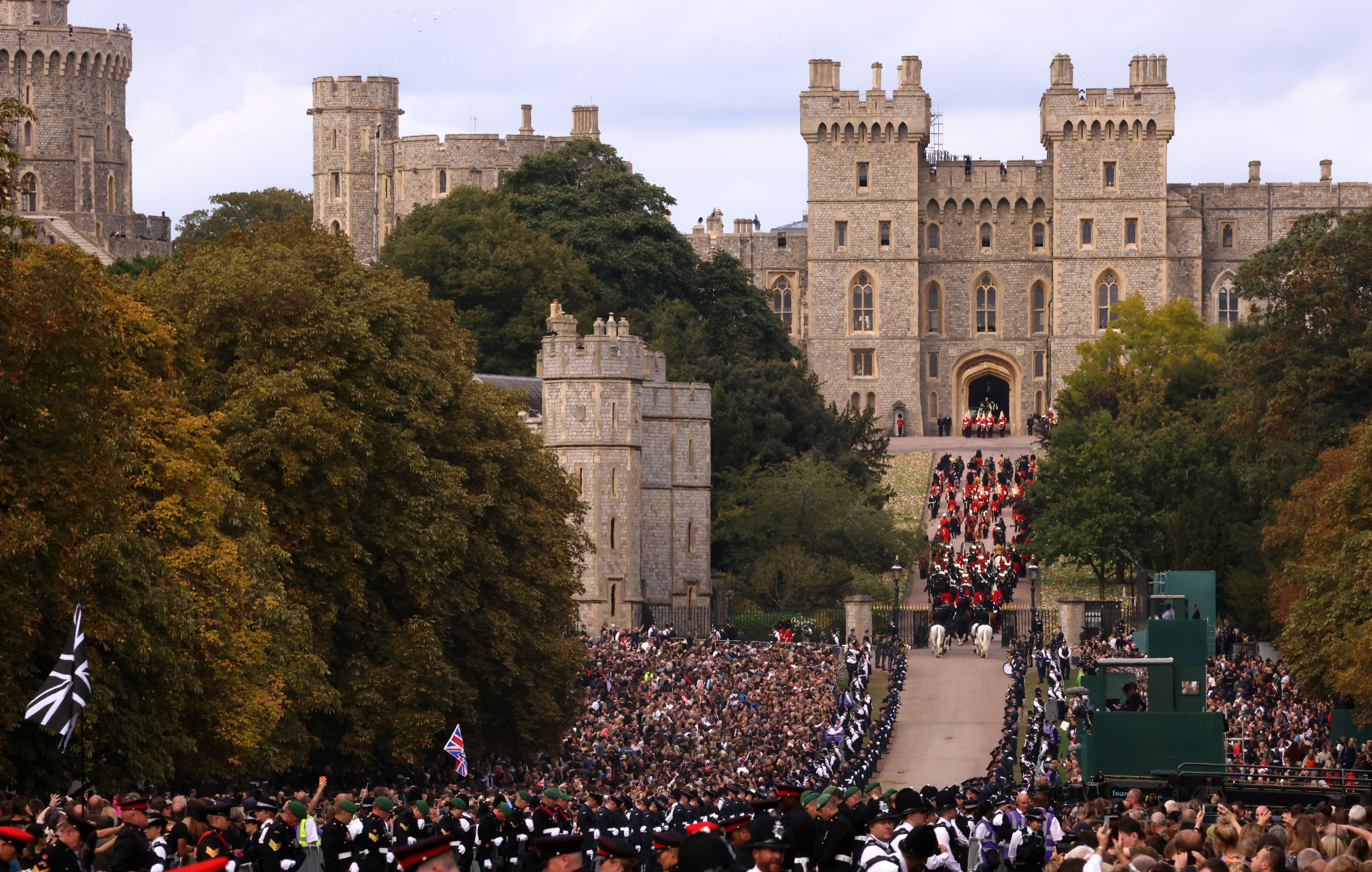 <p>The state hearse procession carrying the coffin of Queen Elizabeth II made its way to Windsor Castle in Windsor, England, after arriving from London on Sept. 19, 2022. Following a televised public committal ceremony inside St. George's Chapel on the castle's grounds, <a href="https://www.wonderwall.com/celebrity/royals/best-photos-from-queen-elizabeth-ii-funeral-king-charles-princes-william-prince-harry-george-charlotte-kate-meghan652347.gallery">the queen was interred</a> with her late husband, Prince Philip, alongside her parents and sister in a private burial attended only by the royal family.</p>