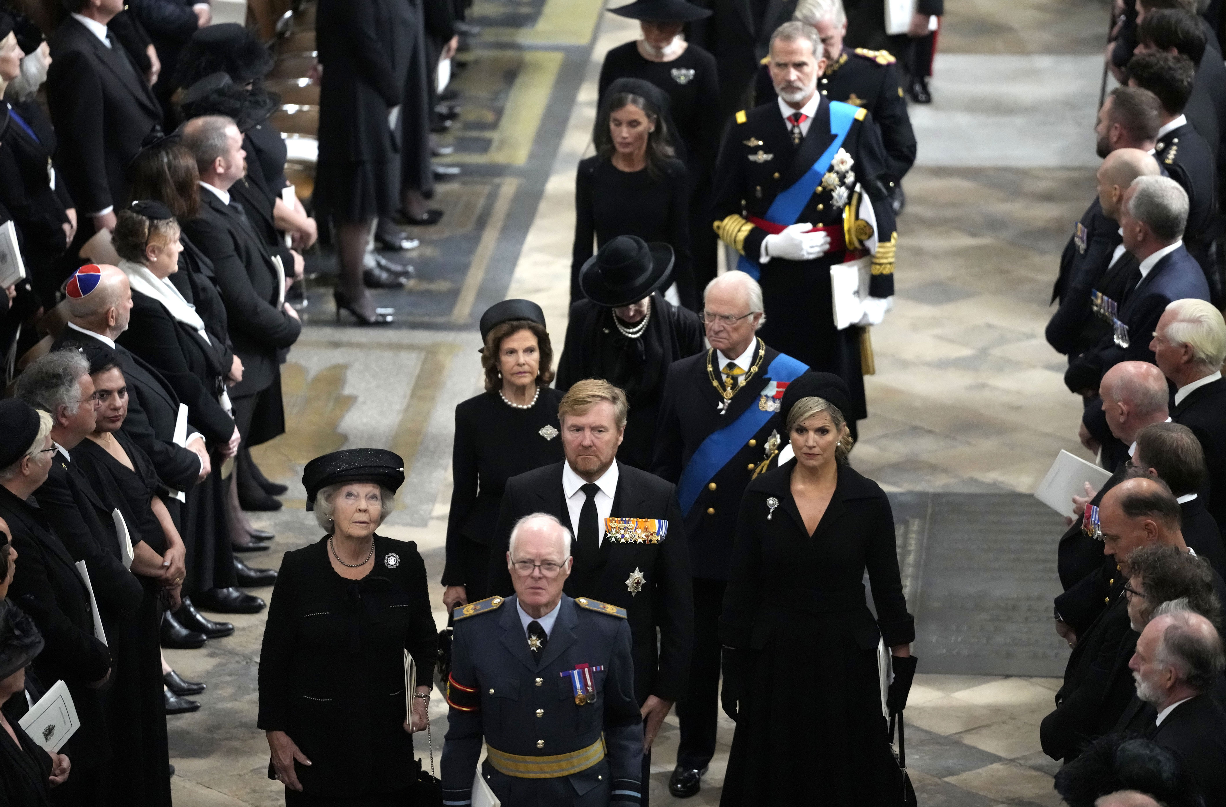 <p>World leaders and royals -- including The Netherlands' former Queen Beatrix and son King Willem-Alexander and his wife, Queen Maxima, followed by Sweden's King Carl Gustaf XVI and Queen Silvia, and Spain's King Felipe VI and Queen Letizia -- attended <a href="https://www.wonderwall.com/celebrity/royals/best-photos-from-queen-elizabeth-ii-funeral-king-charles-princes-william-prince-harry-george-charlotte-kate-meghan652347.gallery">the state funeral</a> of Queen Elizabeth II at Westminster Abbey in London on Sept. 19, 2022.</p>