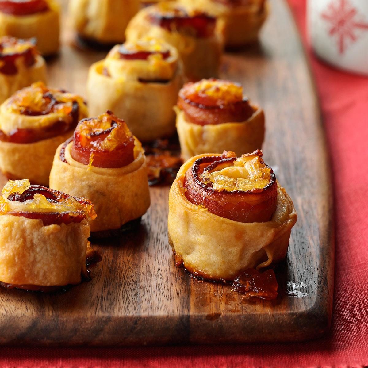 <p>Here’s a real crowd-pleaser for an appetizer table or brunch buffet. A whole piece of crispy bacon is rolled into each spiral. It's so good with the apricot preserves, which make it a sweet-and-salty treat. —Kellie Mulleavy, Lambertville, Michigan</p> <div class="listicle-page__buttons"> <div class="listicle-page__cta-button"><a href='https://www.tasteofhome.com/recipes/apricot-glazed-bacon-spirals/'>Go to Recipe</a></div> </div>