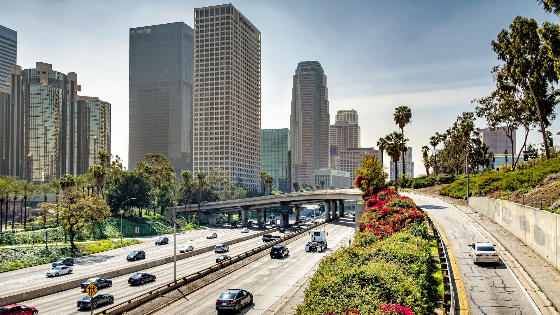 los angeles downtown 110 freeway traffic cars vehicles_iStock-1389974297