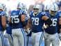 The Indianapolis Colts offensive line resets between plays Sunday, Oct. 2, 2022, during a game against the Tennessee Titans at Lucas Oil Stadium in Indianapolis.