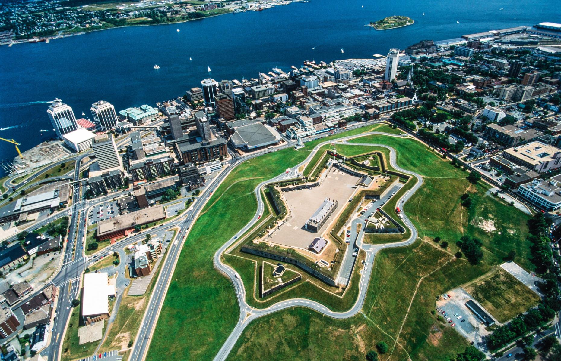 <p>Boasting a blend of historic buildings, like those at the <a href="https://www.pc.gc.ca/en/lhn-nhs/ns/halifax">Halifax Citadel</a> that date back to 1749, and natural coastal beauty, Halifax is a monument to the friendly East Coast spirit. The <a href="https://www.novascotia.com/trip-ideas/stories/halifax-waterfront-day">downtown waterfront</a> features 2.5 miles (4km) of wooden boardwalk, offering views of passing boats and plenty of restaurants serving sumptuous local seafood. Get on the water and paddle out into the harbor to get the best view of the city’s sparkling skyline.</p>