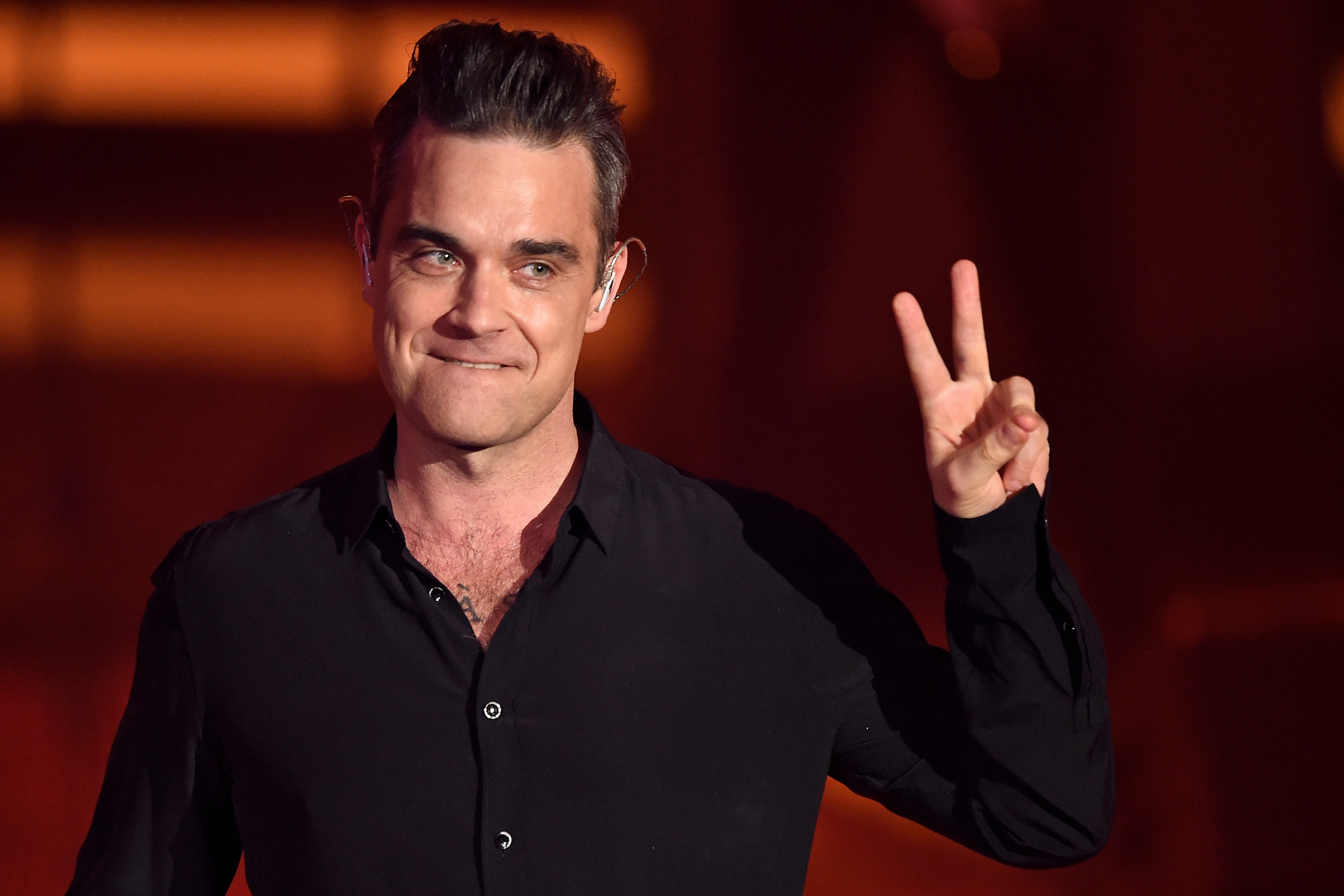 Robbie williams слушать. Робби Уильямс. Робби Уильямс певец. Робби Уильямс 2000. Робби Уильямс молодой