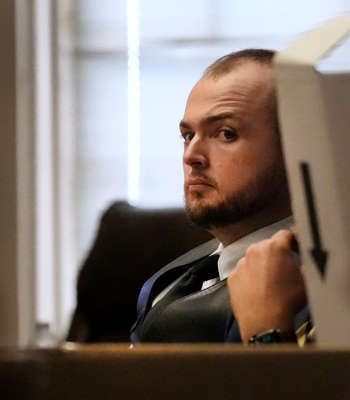 George Wagner IV looks across the courtroom during his trial in Pike County Common Pleas Court in Waverly, Ohio, Monday Sept. 26, 2022. Eight members of the Rhoden family were found shot to death at four different locations on April 21-22, 2016. Wagner's brother Jake Wagner and mom, Angela Wagner, have already pleaded guilty and been sentenced. George's dad, George 'Billy' Wagner III is expected to go on trial in 2023.