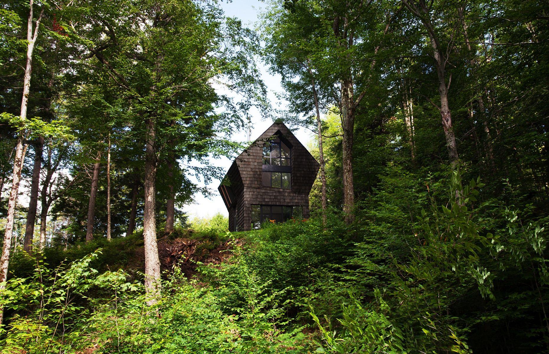 <p>La Colombière was originally created as a small storage space for the local lumberjack, but was later transformed into a hidden hideaway by its new owner. Redesigned by <a href="https://www.yh2architecture.com/">yh2 Architecture</a> in 2015, the clandestine cabin is rustic and contemporary in equal measure. While the outside is clad in dark cedar to match the surrounding conifer trees, the inside is a wonderland of modern design.</p>