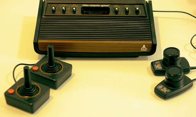 Slide 2 of 23: In the annals of toy history, the Atari 2600 console was the one that truly introduced video games to the world — even if the system cost an insane $200 at the time (nearly $800 after inflation).