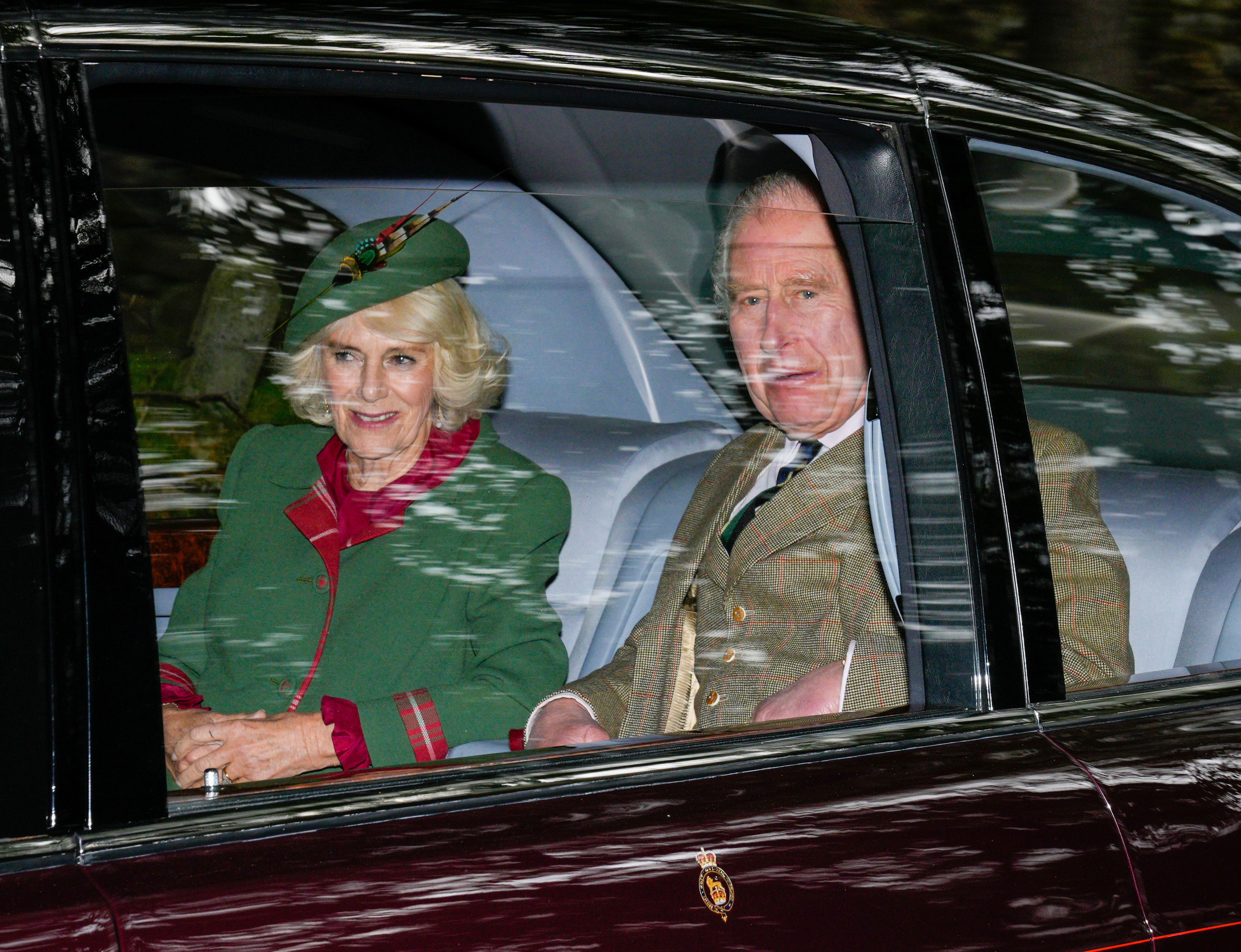 <p>King Charles III and Queen Consort Camilla were snapped leaving Crathie Kirk after attending Sunday church service near Balmoral -- the estate in the Scottish Highlands that he inherited upon the death of his mother one month earlier -- on Oct. 9, 2022.</p>