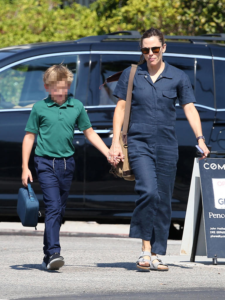 Jennifer Garner picked up Samuel from School in September 2022. The actress rocked a navy blue jumpsuit while holding hands with her son.