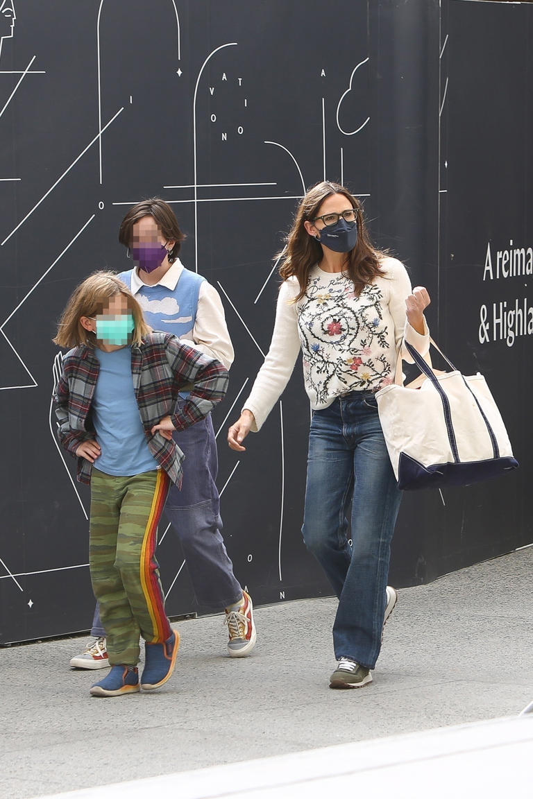Jennifer Garner walks with her kids Seraphina and Sam while out shopping before dropping them off at Lucky Strike for a party in Hollywood. They all wore casual and comfortable-looking outfits.