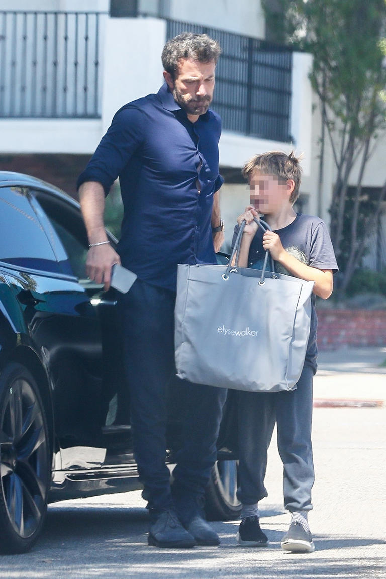 Ben Affleck is spotted out with his son, Samuel, after honeymooning with Jennifer Lopez in Italy. He kept a watchful eye on the ten-year-old as he dropped him off.