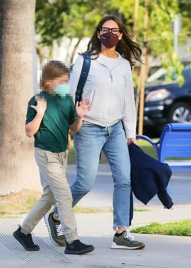 Jennifer Garner carried her son’s backpack after a day at school. Samuel sported a green polo and khakis as he walked with his mom.