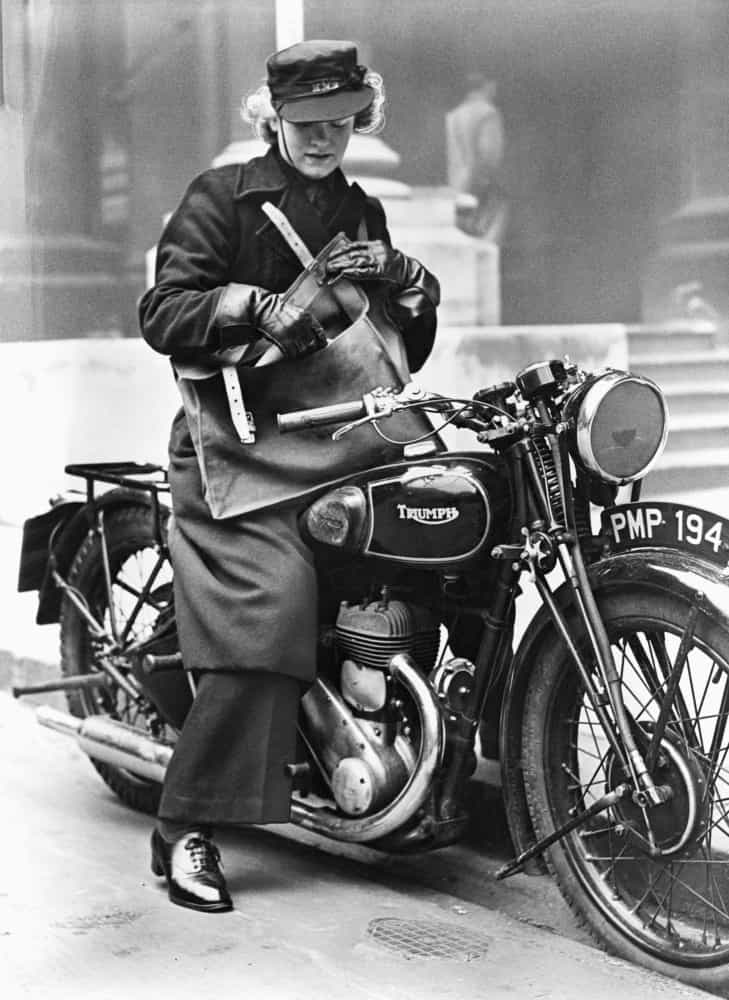 <p>In Britain, women continued to take on jobs normally reserved for men, one such role being postal workers. Here, a woman mail carrier on a  motorcycle prepares to deliver a letter on two wheels.</p><p>You may also like:<a href="https://www.starsinsider.com/n/408367?utm_source=msn.com&utm_medium=display&utm_campaign=referral_description&utm_content=517253en-us"> Actors who got into directing</a></p>