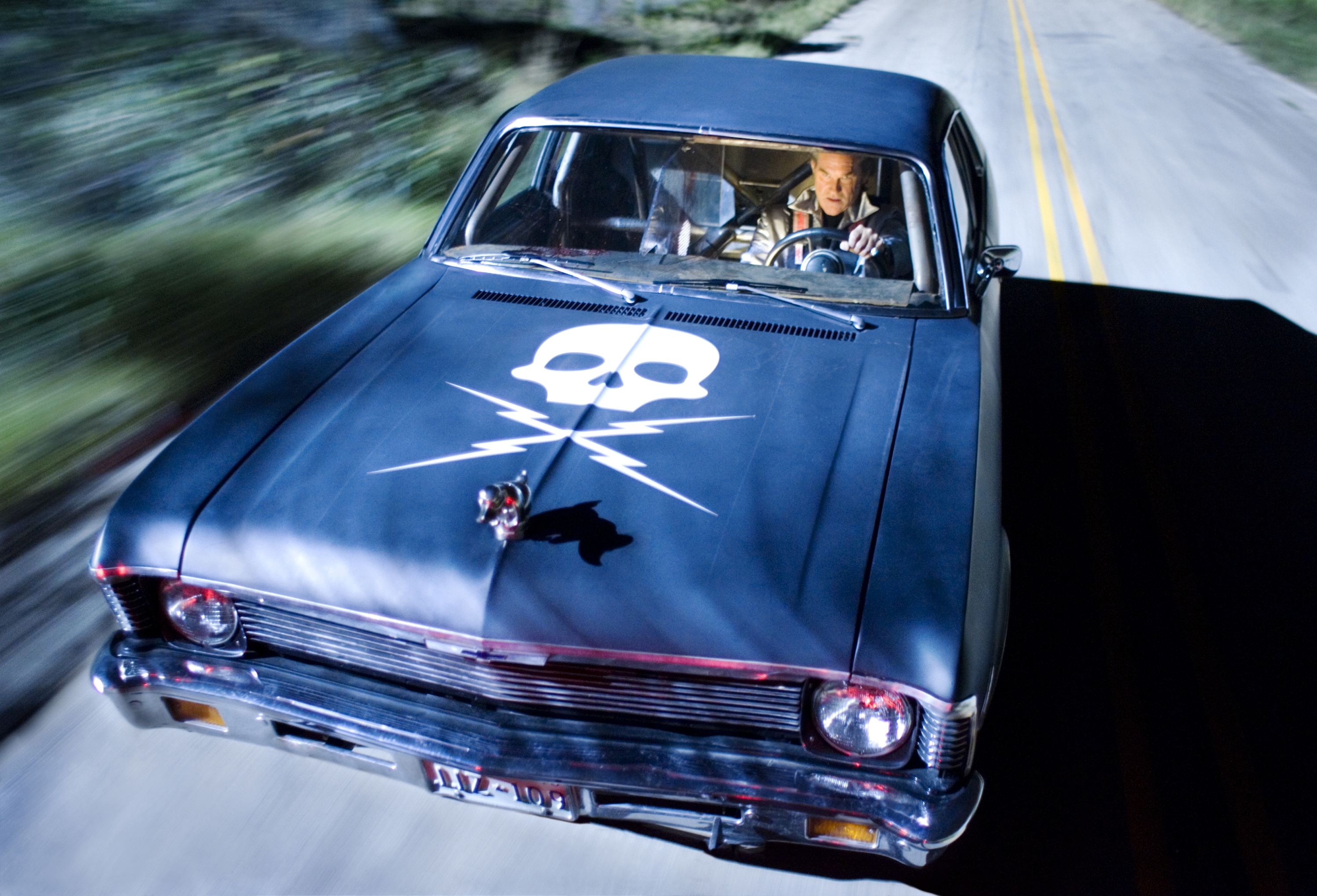 <p>Kurt Russell was ideal for being in <i>Death Proof</i>, the story of a stuntman who liked to take unsuspecting women for rides. In the movie, the driver's seat is a proper racing seat with padding and a reinforced roof panel.</p> <p>As for the passenger side, the seat is a tractor with Plexiglass surrounding it. There were only four of these famous cars built for the movie, and the single fully caged vehicle that ran good enough to do the driving scenes was named "The Jesus." The other, called "The Prius," was destroyed while filming, which left "The Jesus" up for grabs.</p>