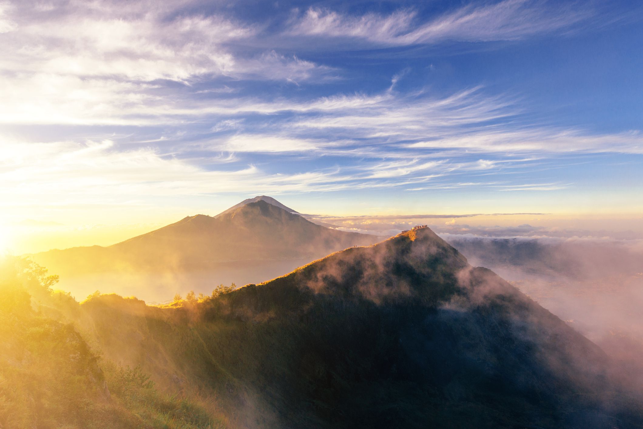 <p><b>Bali, Indonesia<br>Elevation:</b> 5,633 feet<br>The peak of <a href="https://en.unesco.org/global-geoparks/batur">Mount Batur</a> is undoubtedly one of Bali's most scenic attractions, and it's easy to understand why — a blend of green palm trees, white beaches, and a turquoise-blue sea, it's hard to beat. However, you should be prepared for the journey up the mountain: High temperatures mean that most tours start before dawn. Once you're there, you'll be rewarded with some of the island's most spectacular views.    </p><p><b>Related:</b> <a href="https://blog.cheapism.com/overcrowded-tourist-destinations/">24 Beautiful Destinations Threatened By Overtourism — and Where to Go Instead</a></p>