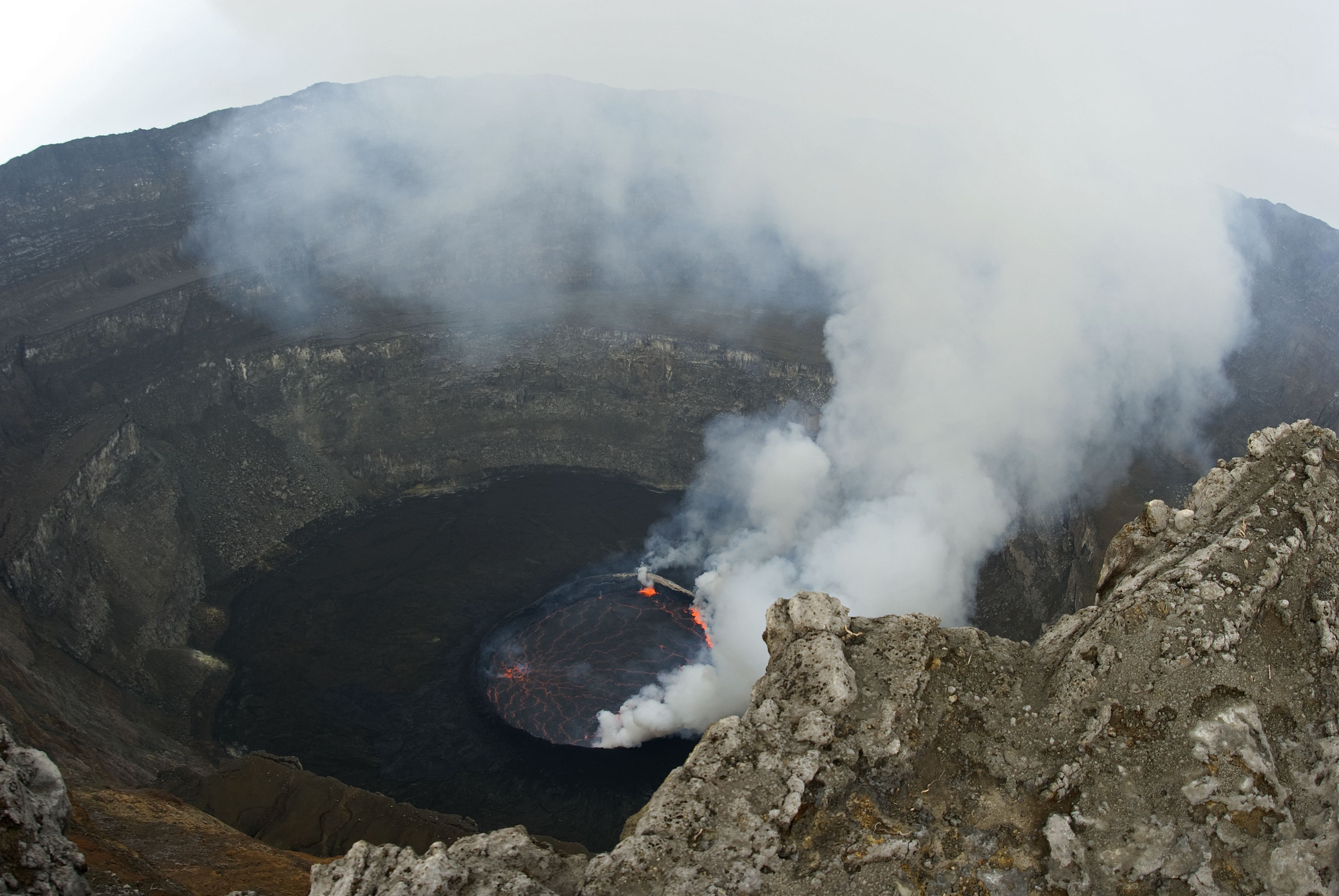 <p><b>Democratic Republic of the Congo<br>Elevation:</b> 11,384 feet<br>The Democratic Republic of Congo’s Nyiragongo hosts the world’s largest lava lake and is one of <a href="https://www.bbc.com/news/world-africa-57280509">Africa's most active volcanoes</a>. It’s not only the volcano <a href="https://visit.virunga.org/treks/nyiragongo-volcano-trek/">that attracts tourists</a> to see it; the beautiful landscape and the rich culture also help to make it a must visit. Visitors also come to see Kivu, a crater lake located less than a mile away.      </p>