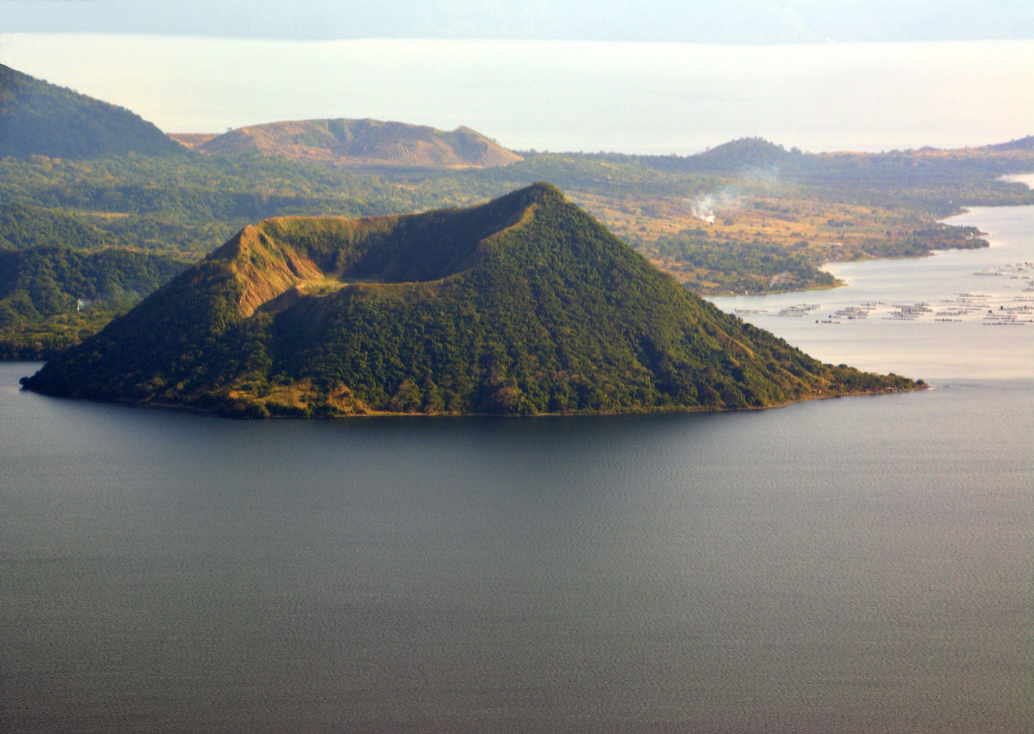 <p><b>Philippines<br>Elevation:</b> 1,020 feet<br>The Taal Volcano is one of the most active volcanoes in the Philippines. It's located on the island of Luzon, and has been active for over 200 years. The last major eruption <a href="https://www.nationalgeographic.com/travel/article/how-philippines-taal-volcano-eruptions-impact-travel">was in 2020</a>, but tours still operate to the volcano and adjacent lake, where visitors can walk along the hardened black lava to the rim of the crater.    </p>