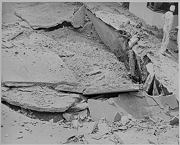 <p>A number of bombs dropped by the Japanese during the attack on Pearl Harbor didn't land on their intended targets. Falling a number of feet from buildings, equipment and vehicles, they left large craters in the ground, leaving large holes.</p>