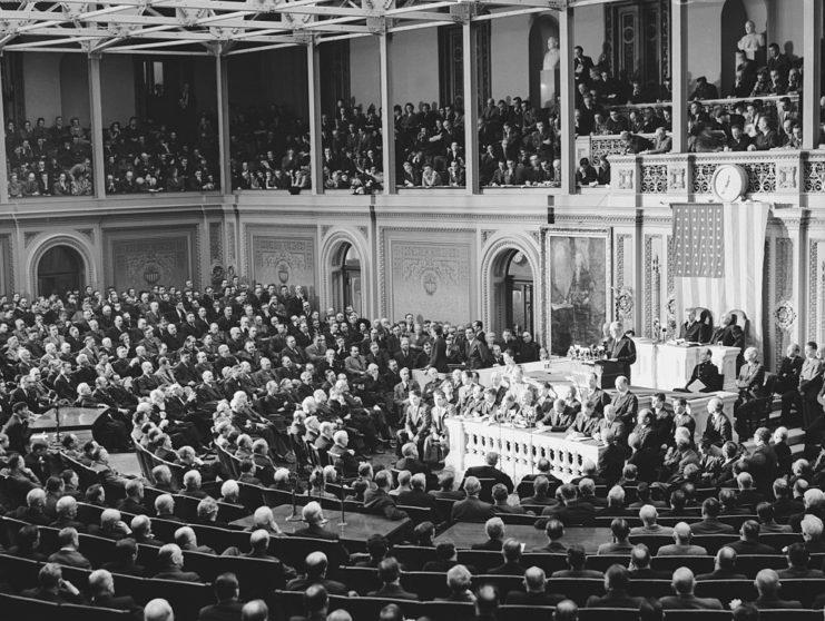 <p>President Franklin D. Roosevelt addressing the US House of Representatives during a vote on whether to declare war against Japan following the attack on Pearl Harbor. The members of the House voted 388-1 in favor of going to war, while the Senate unanimously supported the declaration.</p>
