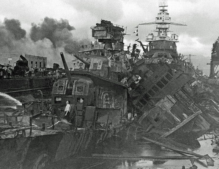 <p>Battleships weren't the only vessels to suffer damage during the attack on Pearl Harbor. This photo shows the severe destruction experienced by the USS <em>Downes</em> (DD-375) and<em> Cassin</em> (DD-372), which were dry-docked at the naval base. A 550-pound bomb caused <em>Downes</em>' fuel tanks to rupture, leading to large fires aboard both vessels.</p>
