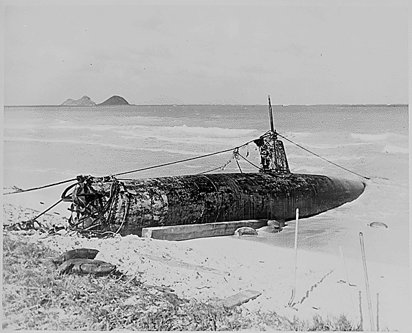 <p>Japanese submarine beached at Bellows Field. While the enemy forces concentrated their attack on the larger American airfields around Pearl Harbor, smaller ones also suffered damaged, albeit on a smaller scale. Six people were wounded and two were killed at Bellows Field.</p>