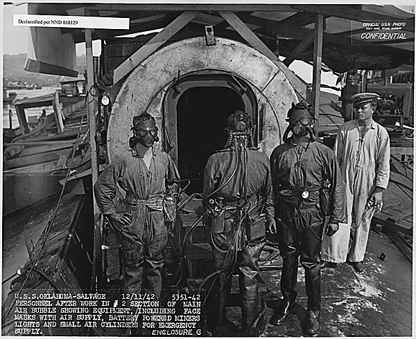 <p>US Navy personnel working on the salvage effort of the USS <em>Oklahoma</em> (BB-39). It was later determined the battleship had suffered too much damaged to be repaired and she was sold for scrap following the removal of her armaments. In 2015, the <a href="https://www.warhistoryonline.com/instant-articles/department-of-defense-26-page-brownie-recipe.html" rel="noopener">Pentagon</a> began the USS <em>Oklahoma</em> Project, dedicated to identifying the unknowns who'd lost their lives on the vessel. The program <a href="https://www.warhistoryonline.com/instant-articles/pentagon-ends-program-to-identify-sailors-killed-during-attack-on-pearl-harbor.html" rel="noopener">ended</a> in 2021, on the 80th anniversary of the attack on Pearl Harbor.</p>