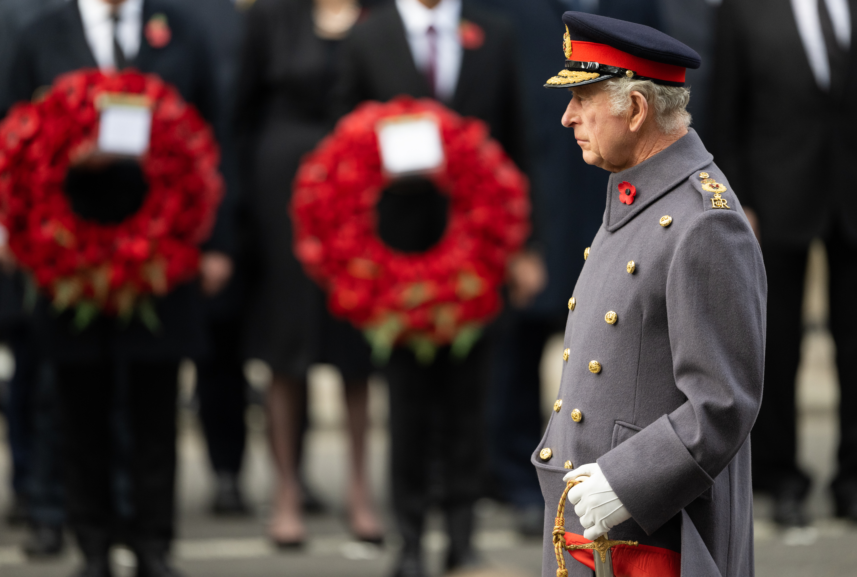 <p>King Charles III is somber as he places a wreath at The Cenotaph during the National Service of Remembrance in London on Nov. 13, 2022 -- his first Day of Remembrance ceremony as sovereign. Remembrance Sunday honors British and Commonwealth military and civilian servicemen and women in both WWI and WWII as well as later conflicts.</p>