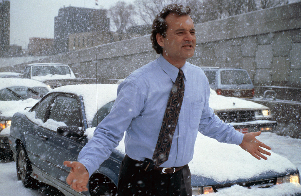 <p>While the film is supposed to take place on February 2, <i>Groundhog Day, </i>the actual filming of the movie occurred between March 16 and June 10, 1992. </p> <p>Towards the end of shooting, the temperature reached upwards of 80 degrees, so they had to bring in fake snow and have the actors wear big winter jackets in the heat of the summer.</p>