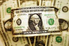 Dollar hits near 7-week low as Fed’s terminal rate approaches