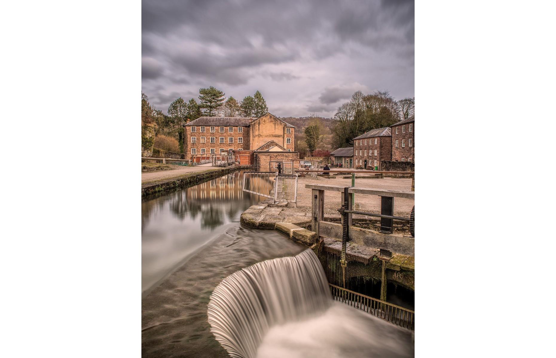 The world's first water-powered cotton spinning mill, Cromford Mill was built on the bank of the River Derwent in 1771 and is one of Britain's most important industrial landmarks. It served as the home of Sir Richard Arkwright, an English inventor and a leading entrepreneur during the early Industrial Revolution. Photographed here by Mike Swain, the site looks especially eye-catching against a gloomy sky.