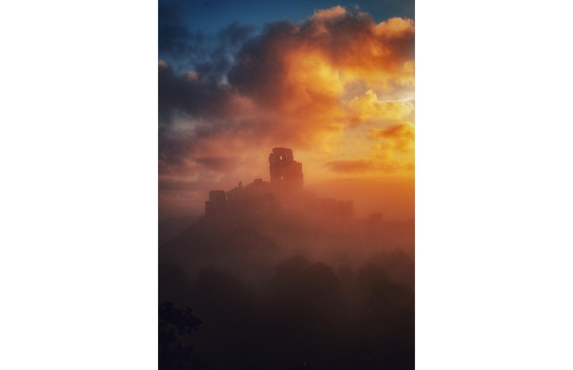 Corfe Castle is such a hotspot for photographers that two entries on the shortlist feature the historic landmark, although the photographs are starkly different. In contrast with the soft, golden tones of Edyta Rice's image, this shot by Keith Musselwhite features bright clouds which glow with a range of orange, indigo and scarlet hues at sunrise, adding to the drama of the composition.