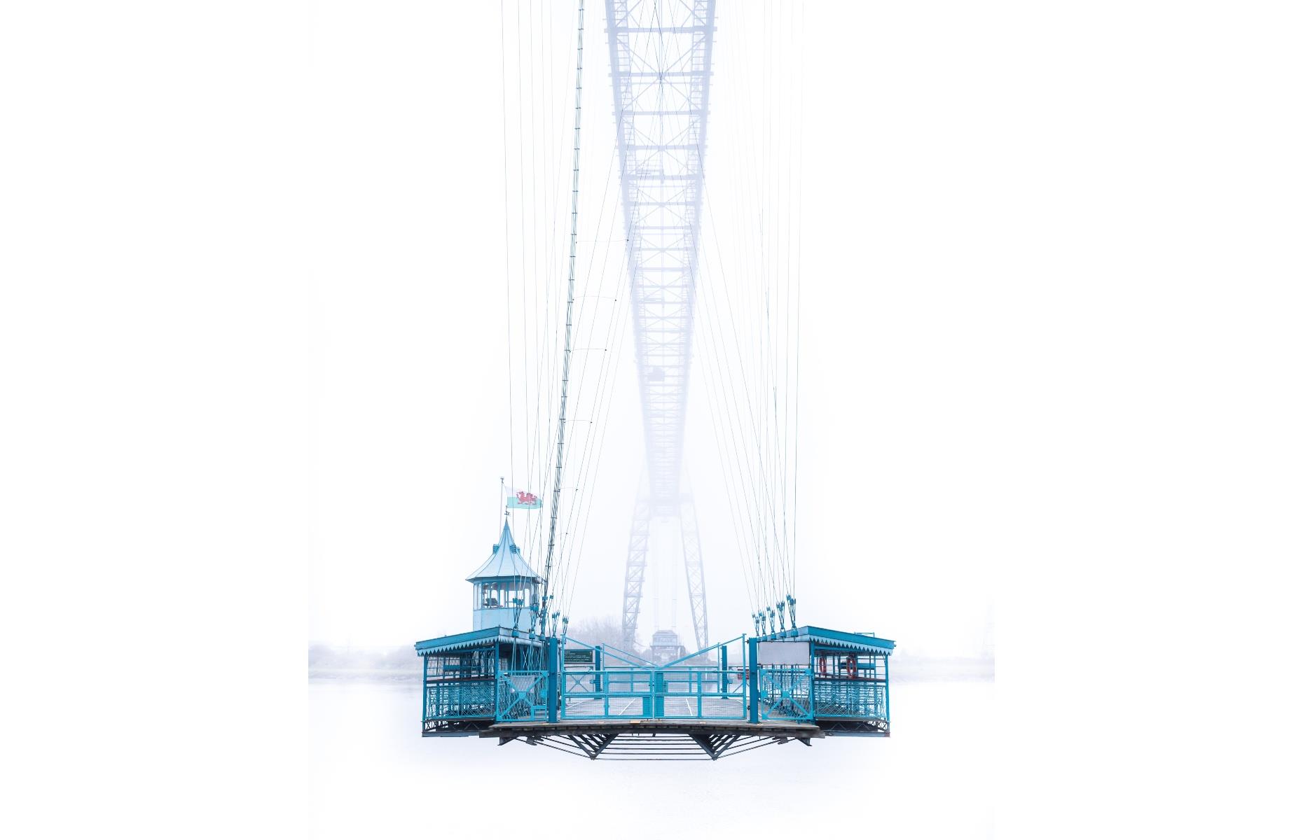 <p>Clearly a magnet for photographers, Newport Transporter Bridge featured twice in this year's awards, in two strikingly different images. We're captivated by the contrast between the vivid structure and the misty backdrop in this shot, taken by local photographer Cormac Downes, who said: "I was lucky one morning to capture it emerging from the fog."</p>  <p><strong><a href="https://www.loveexploring.com/galleries/143952/the-worlds-recordbreaking-bridges?page=1">The world's record-breaking bridges</a></strong></p>