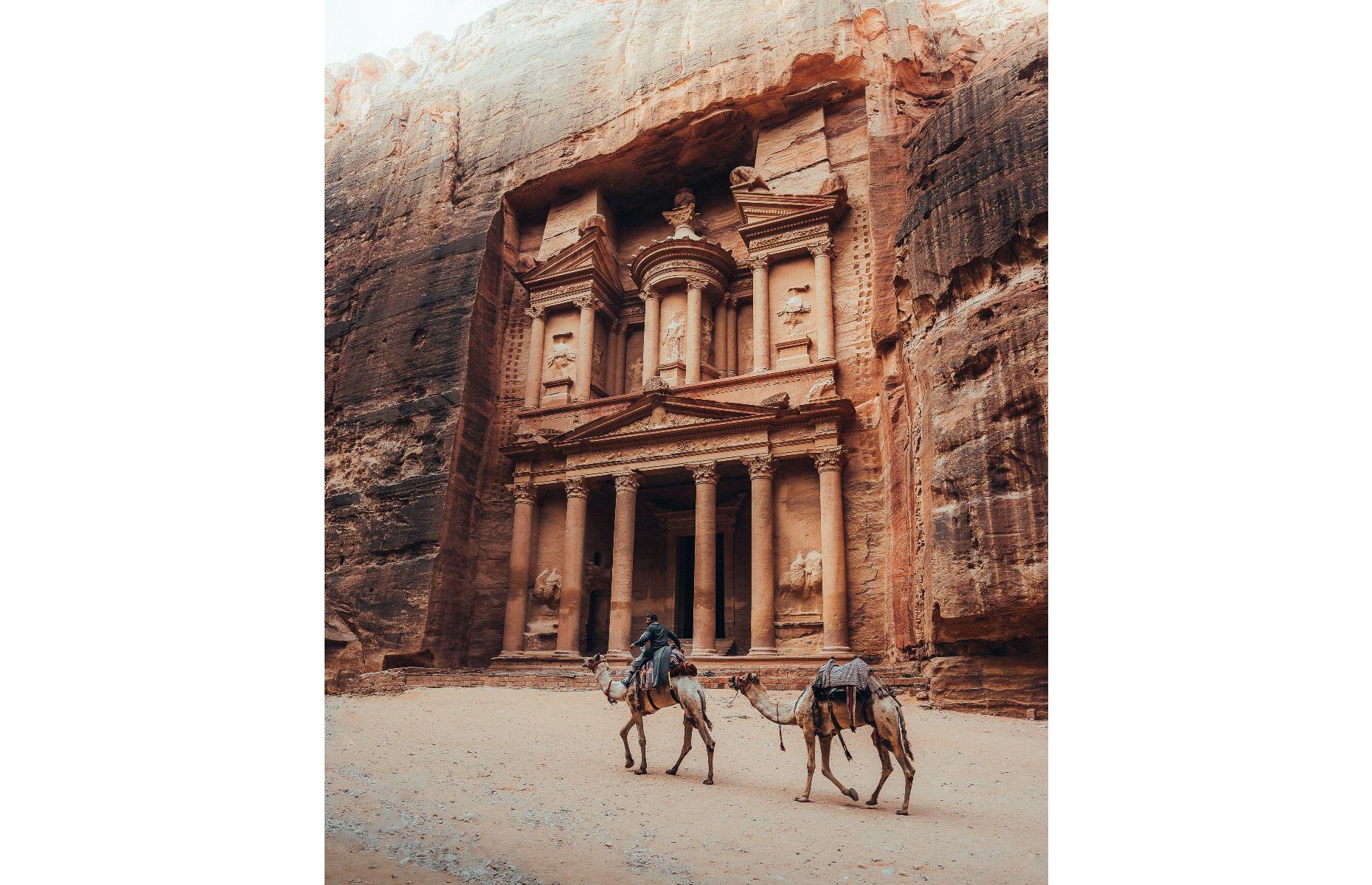 <p>One of the most elaborate temples in the ancient city of Petra, the Treasury (known as al-Khazneh in Arabic) was built some 2,000 years ago yet remains incredibly well-preserved today. You can still make out some of the intricate carvings on the facade, which include two large eagles, two lions and the Egyptian goddess of Isis, although several figures are yet to be identified. Luke Stackpoole was shortlisted in the World History category for this arresting image, in which two camels walk in the foreground. </p>