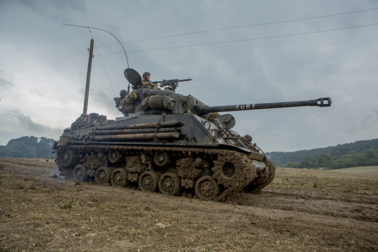 <p>The film <em>Fury</em> debuted in theaters in 2014 and focused on the tank battles between the Allied forces and the German Army during <a href="https://www.warhistoryonline.com/world-war-ii/rats-of-tobruk.html" rel="noopener">World War II</a>. The movie, starring <a href="https://www.thevintagenews.com/2015/07/18/cool-pictures-of-the-young-brad-pitts-photo-shoot-in-1980s-neck-tank-tops/" rel="noopener">Brad Pitt</a> and Shia LaBeouf, was a hit, grossing more than $210 million at the box office.</p> <p><em>Fury</em> was lauded by critics who appreciated the movie's accuracy, especially when it came to the tanks featured in the film. According to <a href="https://www.livescience.com/48245-fury-film-ww2-tiger-tank.html" rel="noopener"><em>Live Science</em></a>, "the Sherman M4A3E8 and the Tiger 131 — are real, and belong to the Tank Museum in Bovington, England." The inclusion of the <a href="https://www.warhistoryonline.com/military-vehicle-news/tank-museum-legend-of-the-tiger.html" rel="noopener">Tiger Tank</a> is especially notable, as <a href="https://tankmuseum.org/" rel="noopener">The Tank Museum</a> is in possession of the last running one.</p>