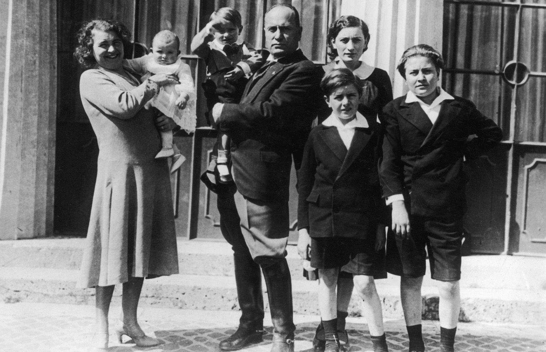 <p>Rome's splendid Villa Torlonia was the official residence of Italian dictator Benito Mussolini, who lived in the property with his wife and five children from 1925, paying a peppercorn rent of just one lira a year. The family are pictured here outside the swish neo-classical palazzo in the early 1930s.</p>