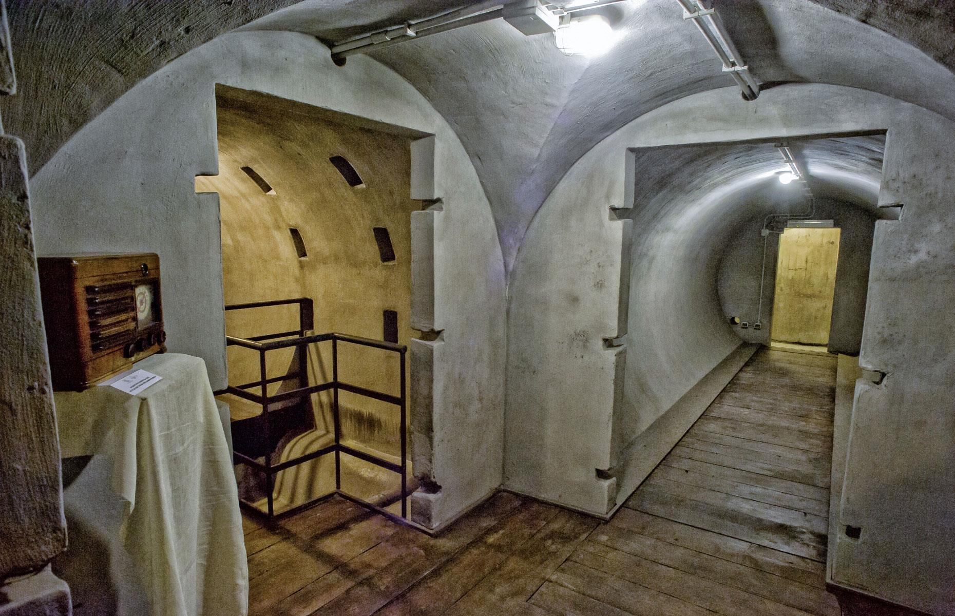 <p>Mussolini had seen Hitler's array of <a href="https://www.loveproperty.com/gallerylist/95780/dream-homes-for-sale-with-their-own-private-bunkers">wow-factor bunkers</a> and was green with envy. Desperate to keep up with his fellow fascist tyrant, he went for the most advanced installation money could buy. The cross-shaped facility was built more than 20 feet under the villa's piazza and fitted with 13-foot-thick concrete walls that could resist the most potent conventional bombs.</p>